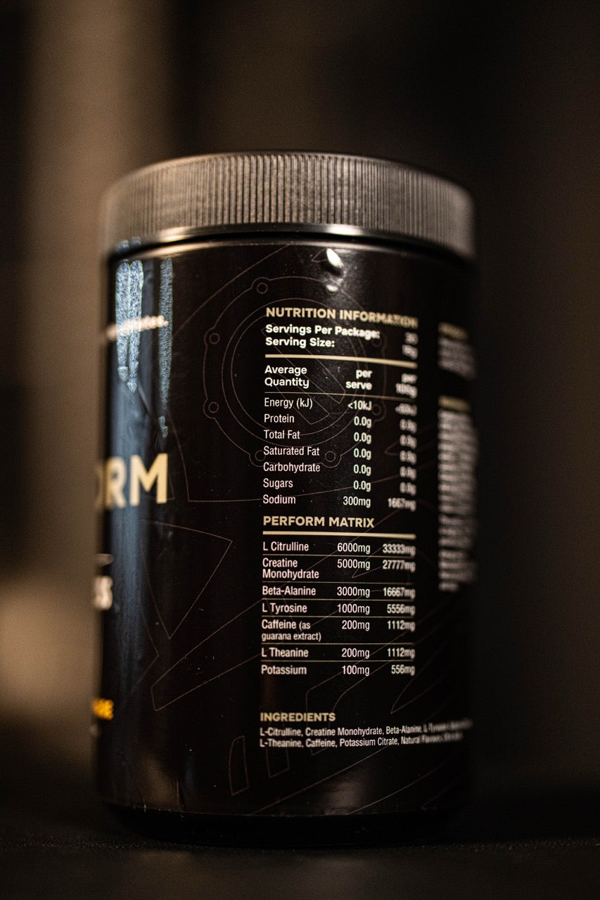 Black supplement container with nutritional information on a dark background